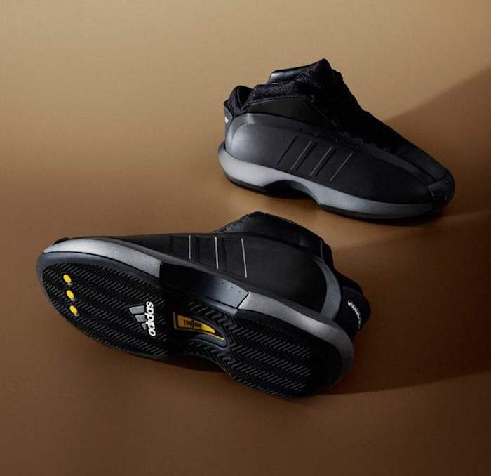 Side view of Kobe Bryant's black adidas sneakers.